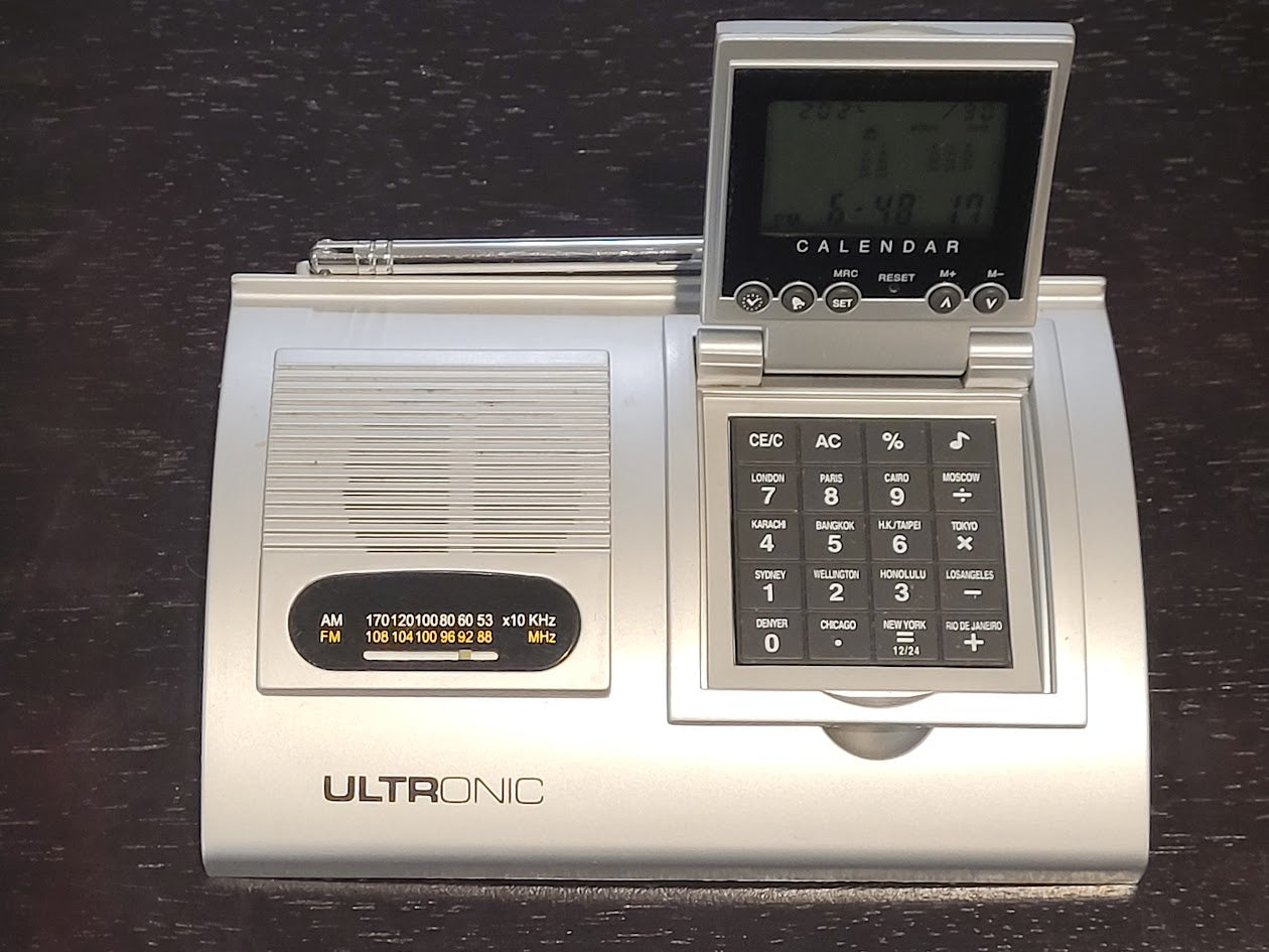 Ultronic Portable Radio with Removable Clock Calculator (Used)