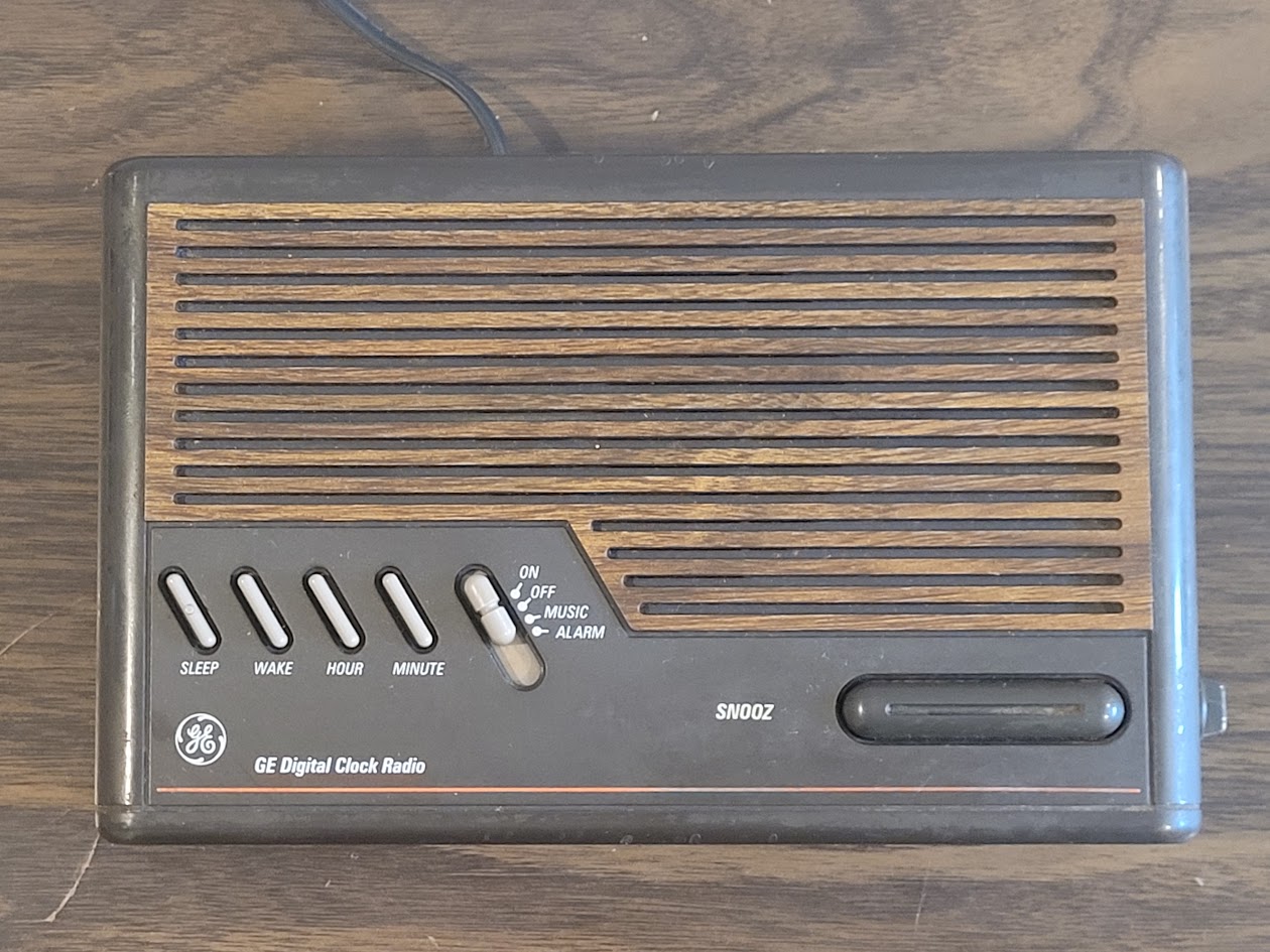 Vintage General Electric Digital Alarm Clock Am/FM Radio in Faux Wood Grain (Used)